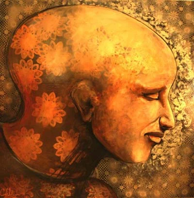 Golden portrait of a bald head in profile with ornamental floral pattern